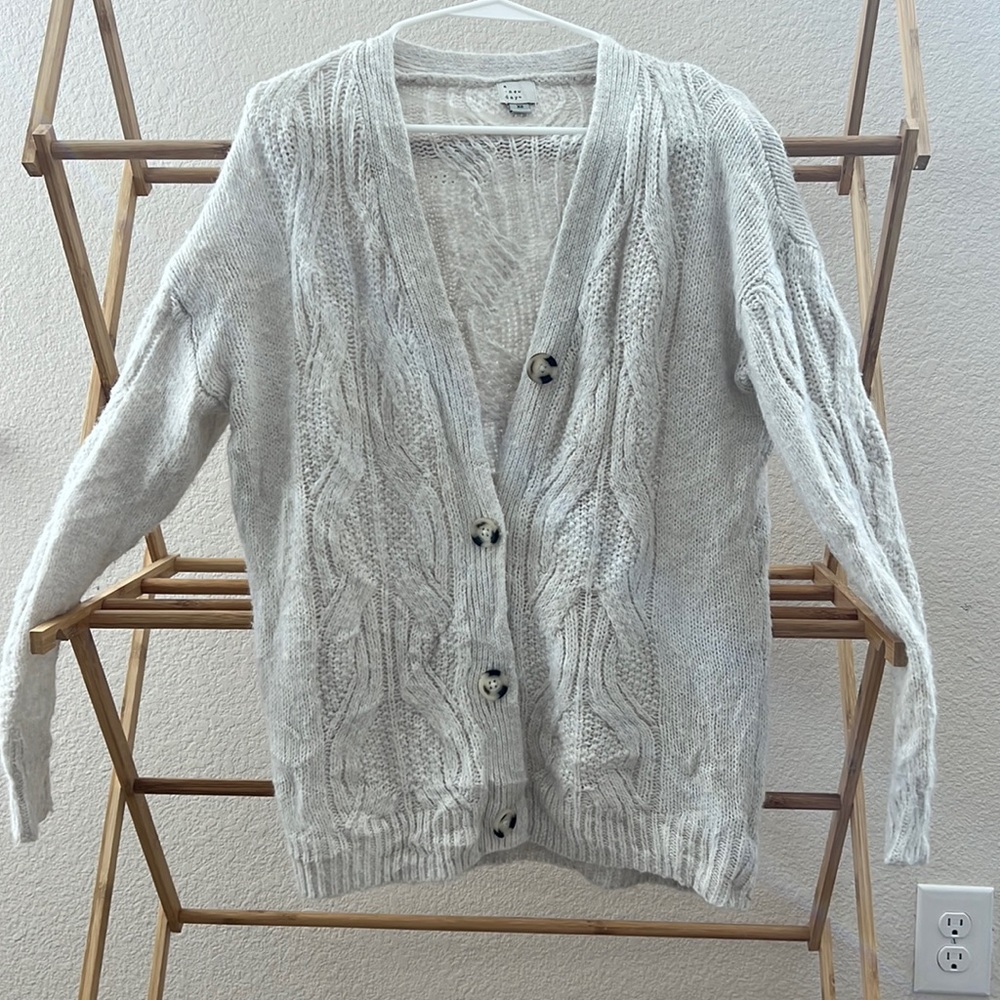 Woven Cardigan XS, fits more like a M. It is oversized